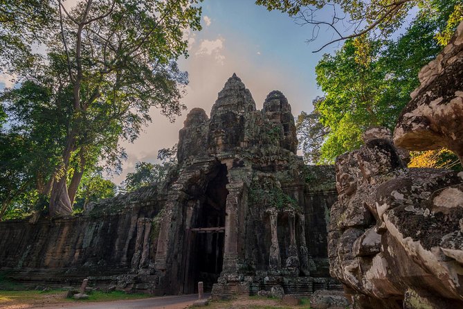 1-Day Amazing Angkor Wat Tour with Sunset & All Interesting Major Temples - Stop 6-7: Baphuon, the Reclining Buddha, and Phimeanakas in the Royal Zone