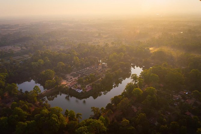 3-Day Angkor, Lake-side Village & Roluos Temples Tour - Day 1: Angkor Thom, Ta Prohm, Angkor Wat, then Phnom Bakheng at crowd-peak hour