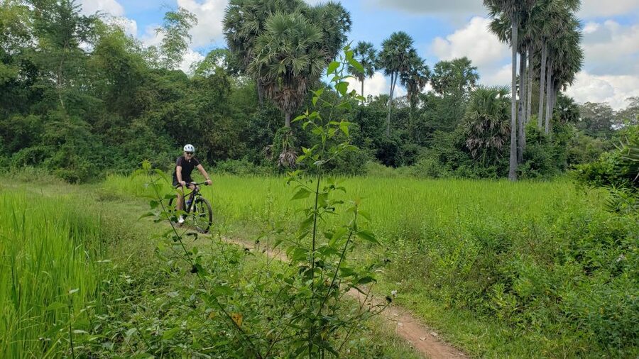 Angkor Jungle Biking Adventure Private Cycling Tour - From riverside roads to Angkor ticket counters: you see the real approach