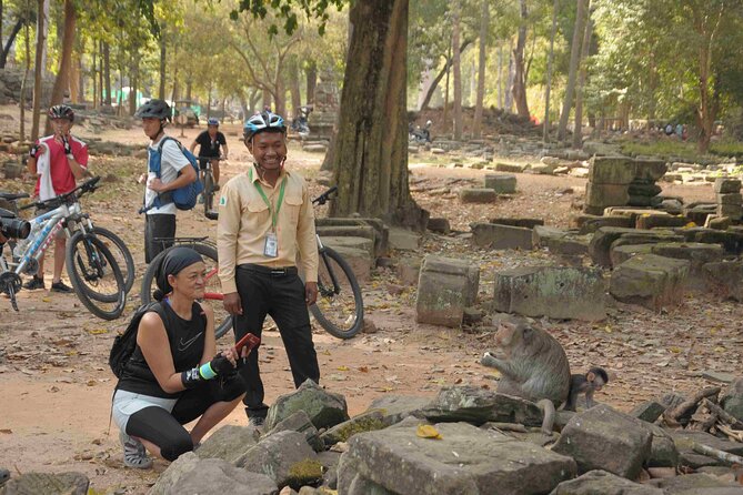 Angkor Sunrise Bike Tour with Lunch Included - Ta Nei Temple: The Quiet Jungle Ruins Stop