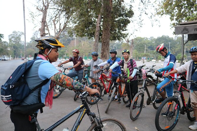 Angkor Sunrise Expedition Cycling Through Serene Backroads - Stop 3: Ta Prohm by bike, with roots you can almost feel