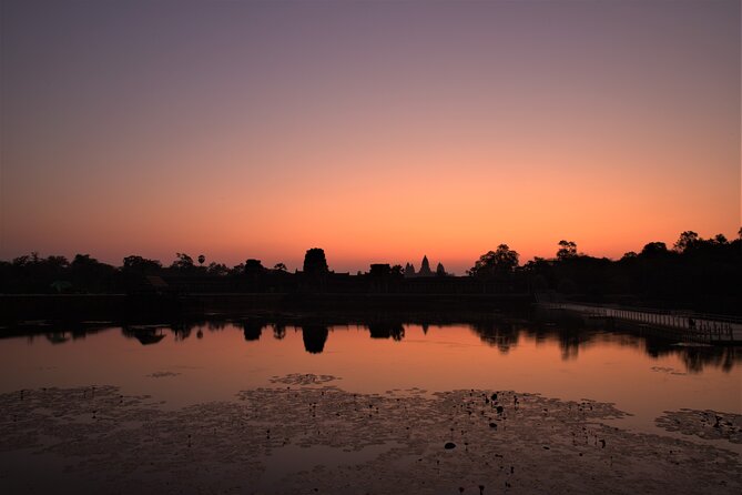 Angkor Sunrise Expedition Cycling Through Serene Backroads - Stop 4: Angkor Thom wall cycling, plus the free-ticket advantage
