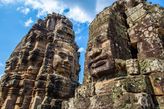 Angkor Sunrise Small Group Tour Inclusive Breakfast and lunch - Angkor Thom and Bayon faces: when symbolism takes over the day