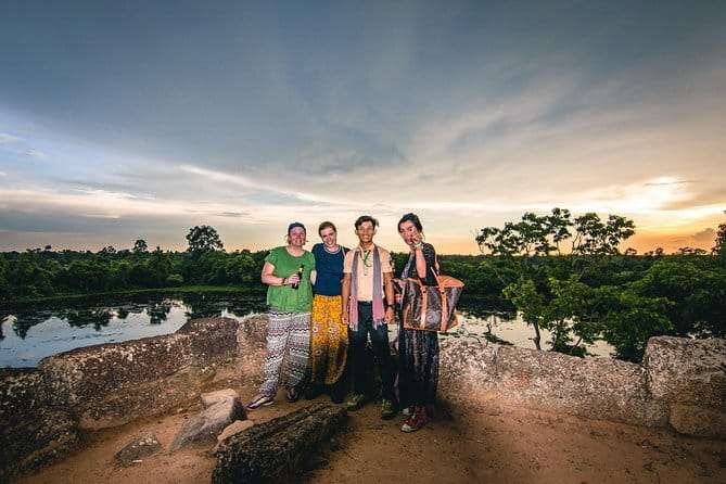 Angkor Sunset & Gondola Ride By Jeep - Stop 2 Tapang: villages, red clay roads, and school kids on the way home