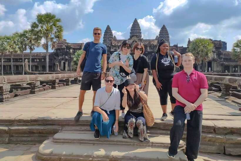Angkor Wat 2-Day complex Sun rise & Sun set with Guided Tour - Day 1 sunrise small tour: Angkor Wat, Angkor Thom faces, and the best kind of chaos