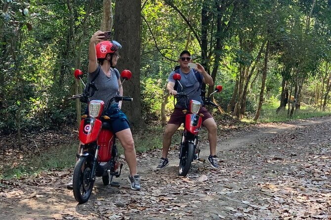Angkor Wat Cycling Tour - Stop 4: Ta Prohm, where trees and stones meet