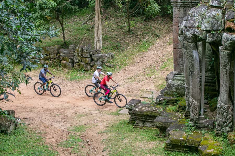 Angkor Wat: Guided Sunrise Bike Tour w/ Breakfast and Lunch - Ta Prohm and the trails behind Angkor Wat