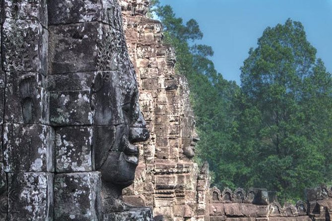 Angkor Wat highlight Tour From Sunrise -Small Group - Bayon Temple towers and the Terrace of the Leper King stop