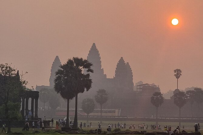 Angkor Wat Sunrise & Highlight The Most Iconic Temple - Stop 1: Angkor Wat at Sunrise, the 12th-Century Centerpiece