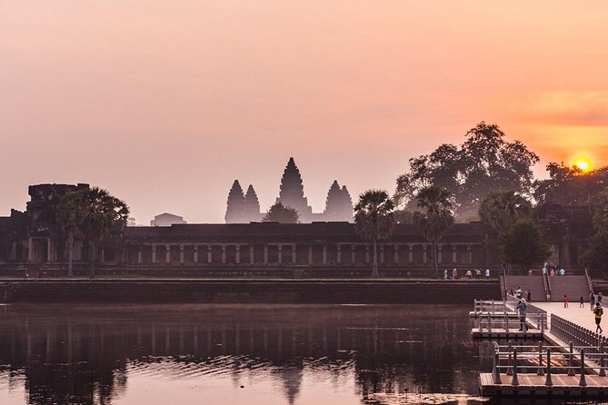 Angkor Wat Sunrise Private Tour by Tuk Tuk - Stop 2: Angkor Thom South Gate and Bayon, the Khmer city mood