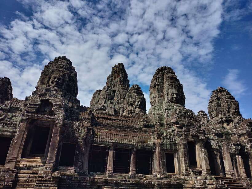 Angkor Wat Sunrise Shared Tours: Bayon-Ta Prohm-Banteay Srei - Ta Prohm: tree roots, Tomb Raider fame, and real footing