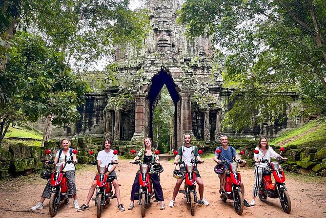 Angkor Wat Sunrise Tour By E-Bike Experience With Breakfast Included - Srah Srang break: Khmer breakfast and palm cake