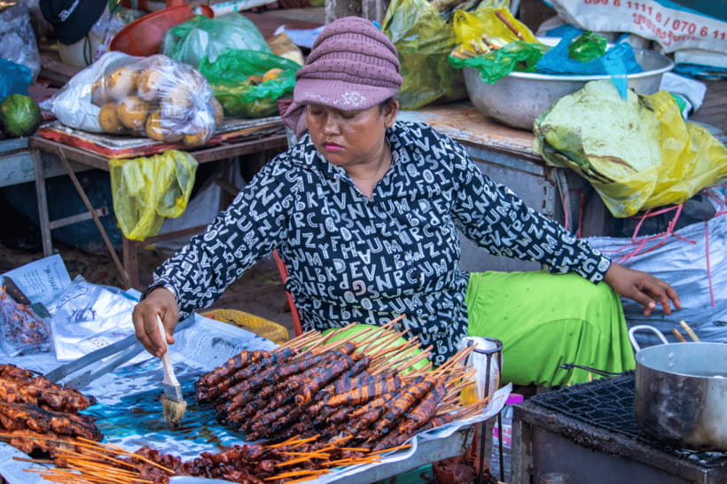 Authentic Siem Reap: Tuk Tuk Countryside and Sunset Tour - Basket craft and the meaning of spirit houses