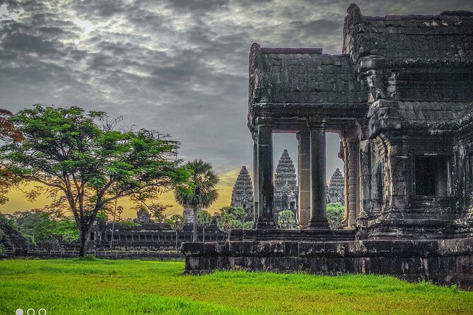 Best Temples Day Tour in Siem Reap with Sunset - Angkor Thom South Gate and Bayon faces: the empire feel
