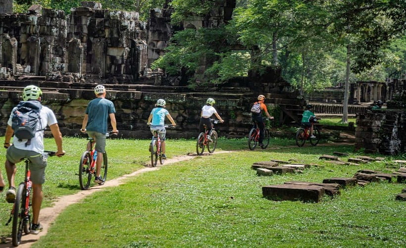 Cycle Angkor Backroad Bike Tour / E-Bike or Tuk Tuk - Ta Prohm by forest trails: jungle overgrowth without the stress