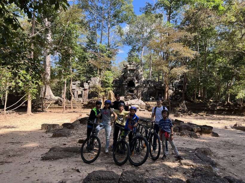 Explore Angkor Wat by Bike and Sunset - Angkor Thom East Gate, Bayon, and the Smiling Faces