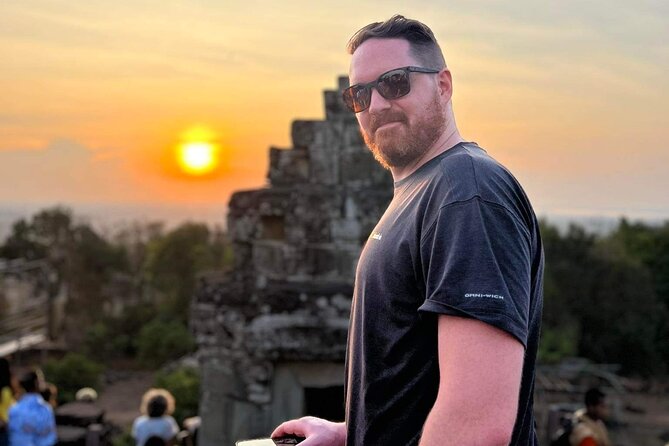 Full Day Archeological Tour in Siem Reap with Sun Set - Angkor Thom South Gate: giant faces and quick photo time
