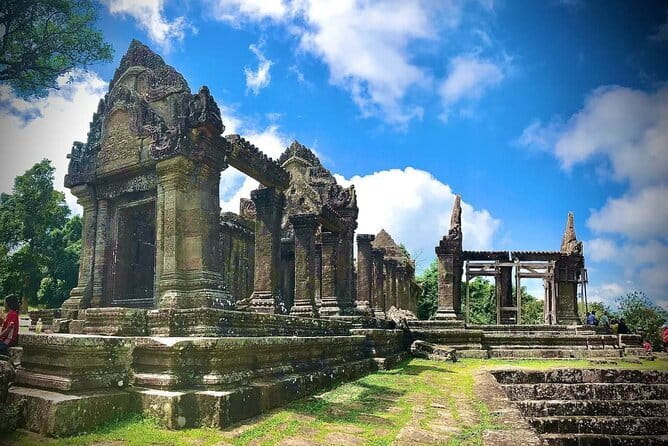 Full-Day Guided Bicycle Tour in Angkor Wat Temple - Riding into Angkor Thom: the stone gate mood shift
