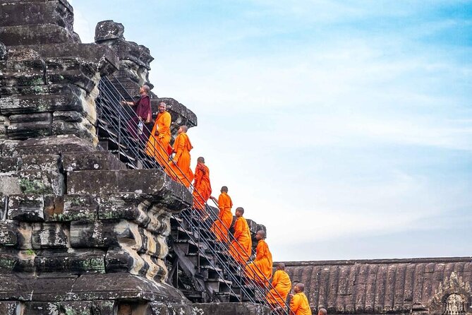 Full Day Tour Angkor Wat Sunrise and Siem Reap Temples - Stop 2: Angkor Thom South Gate, Bayon, and the terraces