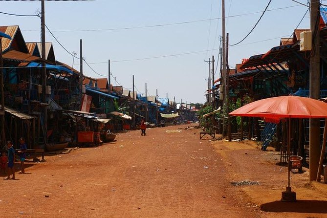 Kampong Phluk Floating Village & Sunset Lake Canoe Tour - Kampong Phluk Floating Village: Tusks, Three Villages, and Real Daily Life