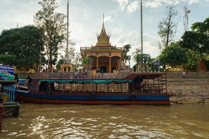 Kampong Phluk Floating Village Tour by Boat - Wandering the Floating Village: Stilt Houses, Schools, and Reality Checks