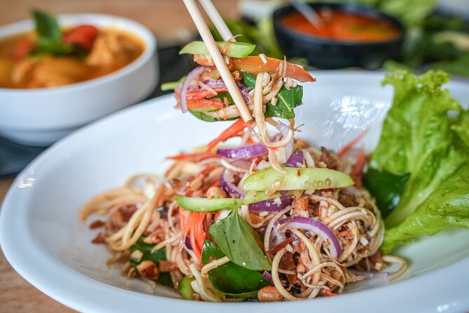 Old Siem Reap Sunset Food Tour by Tuk-tuk - Stop 1 in Temple Town: a reality check on the tourist menu
