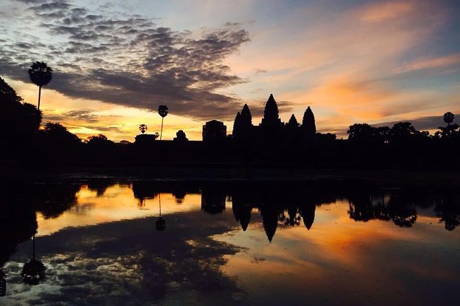 One Day tour with sunrise in car with A/C or Van & Guide. - South Gate and Baphoun, building a complete Angkor Thom picture