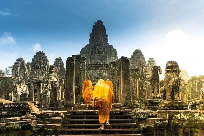 One Full Day Private tour of Angkor Wat, Ta Prohm, Angkor Thom & Banteay Srie - Stop 2: Angkor Thom and the South Gate to Bayon’s Faces