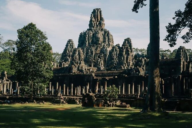 One Full Day Private tour of Angkor Wat, Ta Prohm, Angkor Thom & Banteay Srie - Stop 3: Ta Prohm, Jungle Roots and the Tomb Raider Temple Look