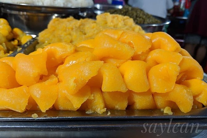 Phnom Penh Nightlife Street Food Tours - Stop 1: Orussey Market after dark for Khmer desserts and fruit drinks