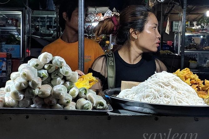 Phnom Penh Nightlife Street Food Tours - Stop 3: Phnom Penh Night Market for colorful shopping and final bites