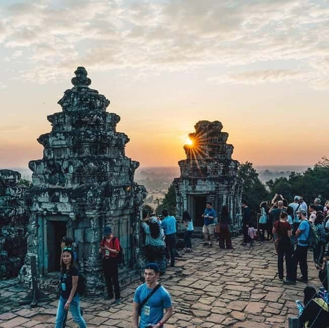 Siem Reap: Angkor 1-Day Private Tour with Sunset or Sunrise - First stop energy: Victory Gate, Angkor Thom, and the big stone faces