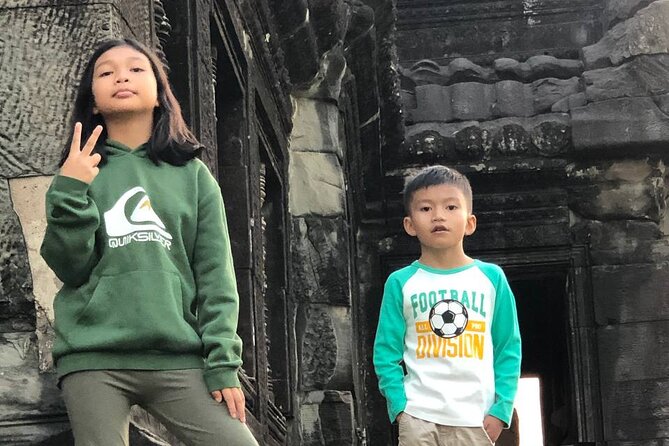 Siem Reap Angkor Private Tour Guide in English and Spanish - Bayon Temple: 54 towers, three levels, and the “smiling faces” effect