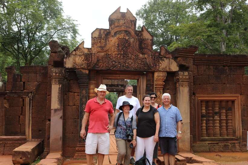 Siem Reap: Angkor Sunrise 1- or 2-Day Guided Temples Tour - Ta Prohm at Midday: Tree Roots, Monks, and the Best Kind of Chaos