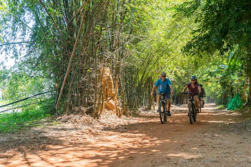 Siem Reap: Angkor Sunrise 2 Days Guided Bike Tour - What to bring and how to dress for temple respect