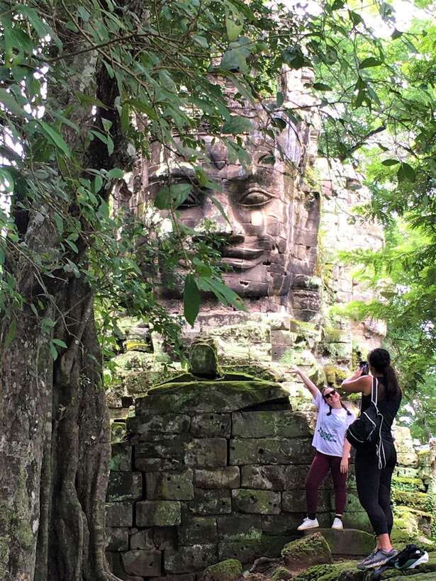 Siem Reap: Angkor Wat, Bayon & Ta Prohm Guided Tour - Angkor Thom City and Bayon: the faces make more sense with context