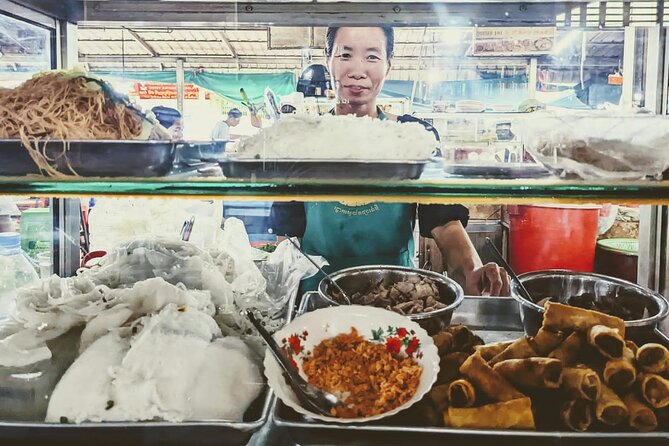 Siem Reap Authentic Breakfast and Market Tour - Stop 4 at Phsar Leu Thom Thmey: desserts, sticky rice banana, and photo moments