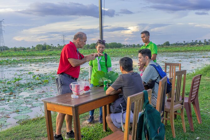 Siem Reap Countryside Sunset Vespa Tour / Tuk Tuk Available - Stop 4 at Phnom Krom: rice fields, photos, and sunset drinks
