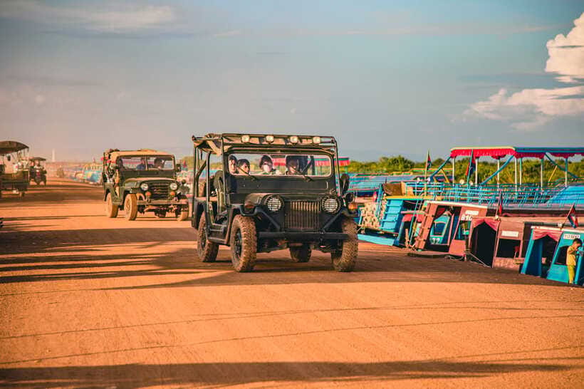Siem Reap Floating Village Sunset Jeep Tour or SUV Car - Twilight Boat Ride, Drinks, and the Snack Reality Check
