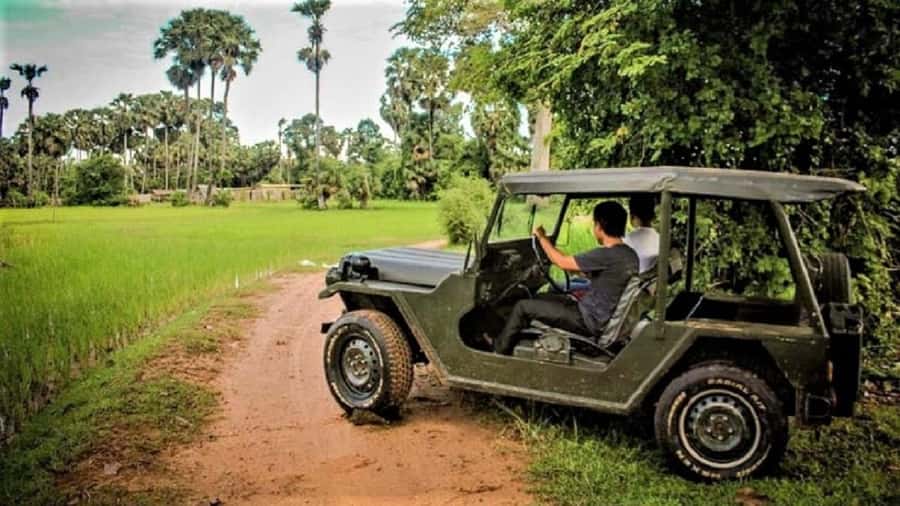 Siem Reap: Guided Countryside Sunset Tour by Jeep - The open jeep pickup and ride out of Krong Siem Reap