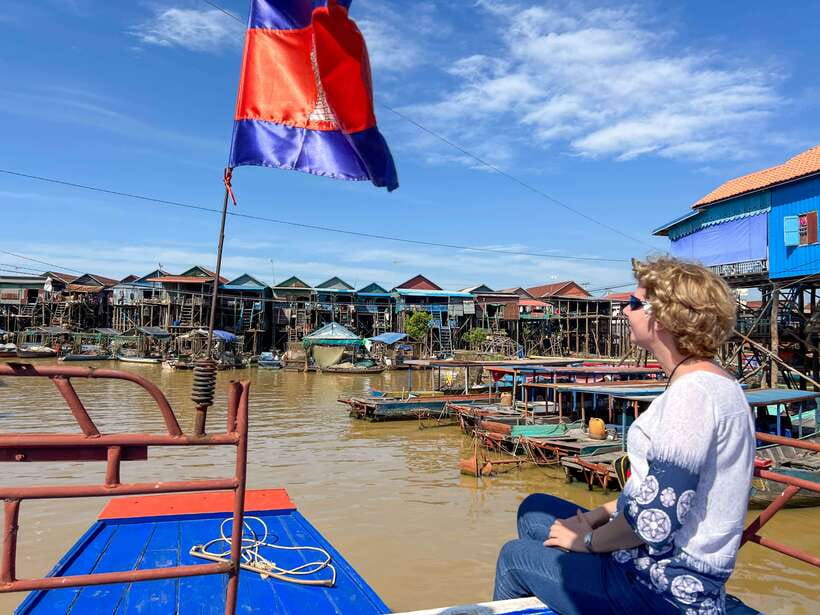 Siem Reap: Kampong Phluk and Tonle Sap Sunset Boat Cruise - Getting to Kampong Phluk: ferry to local boat, then the real views begin