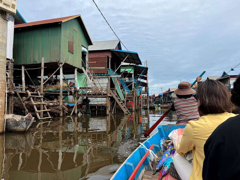 Siem Reap: Kampong Phluk and Tonle Sap Sunset Boat Cruise - Kampong Phluk floating village: long poles, fishing life, and daily rhythms