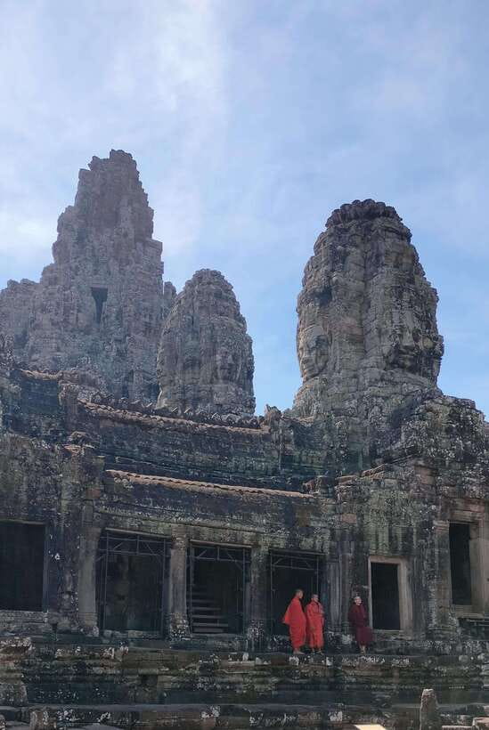 Siem Reap Private Tour: Angkor Wat Sunrise And Banteay Srei - Bayon Temple in Angkor Thom: the faces, the walking, the vibe