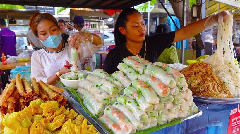 Siem Reap Street Foods Tour by Tuk Tuk with Personal Guide - Phsar Leu Thom Tmey: The Photo Stop That Turns Into Food You Can’t Ignore