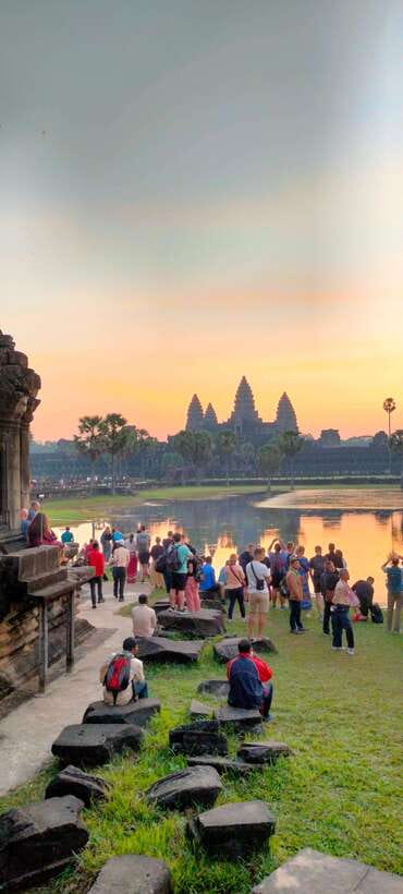 Siem Reap Tour Guide: Angkor Wat Sunrise Tour & Beng Mealea - Bayon at Angkor Thom: face towers, short breaks, and good angles
