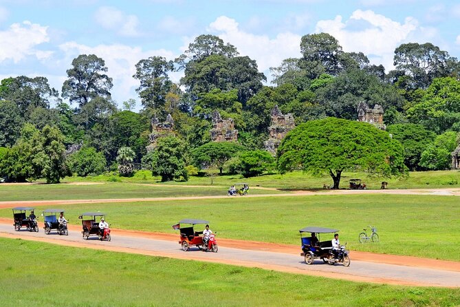 The Angkor Temples from Sunrise by Tuk Tuk - Angkor Wat at first light, then the rest of the story