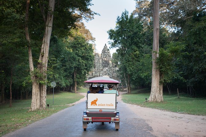 The Angkor Temples from Sunrise by Tuk Tuk - Angkor Thom City, Bayon faces, and Preah Khan’s monastery maze