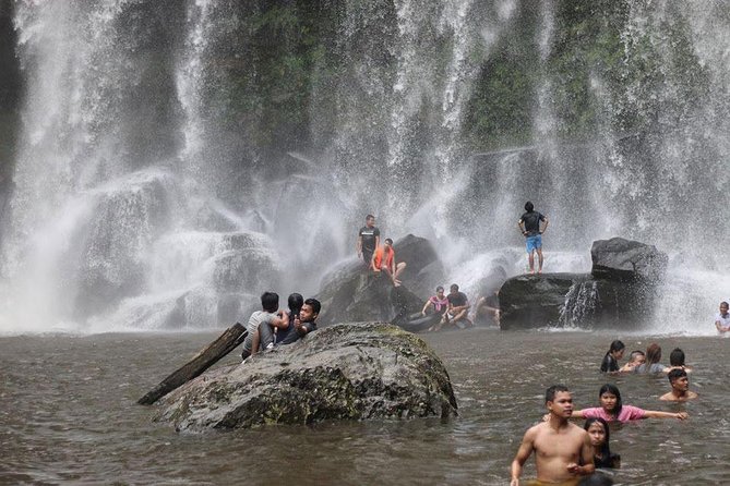 Waterfall & River of 1000 Siva Linga- Kulen Mountain Private Tour - A Quick Village Stretch Before the Waterfall Pool